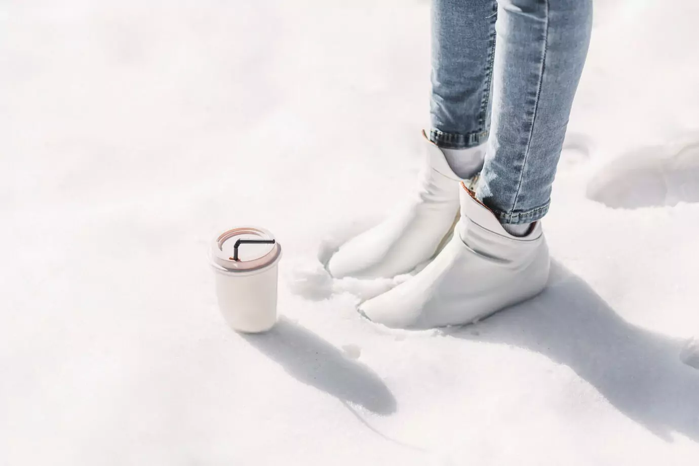 low-section-woman-with-takeaway-coffee